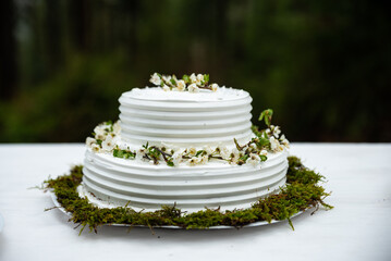 Two Tier White Wedding Cake with Florals

