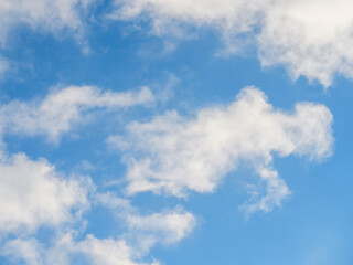Light soft clouds against a blue sky