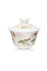 Detailed shot of a white original porcelain color printed gaiwan in chinese style. The designer bowl with a lid is isolated on the white background.