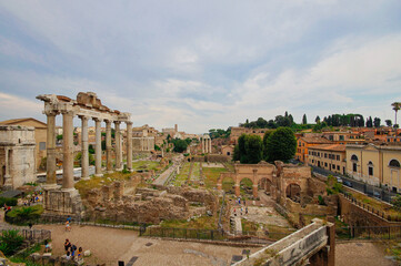 Fototapeta premium Photo of Foro Romano in summer and the old quarter is nearby, Rome , Italy
