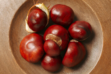 Fresh and ripe chestnuts, close up, Autumn chestnuts