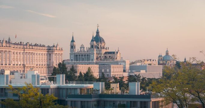 Almudena cathedral  and Royal Palace zoom view during sunset timelapse in Madrid