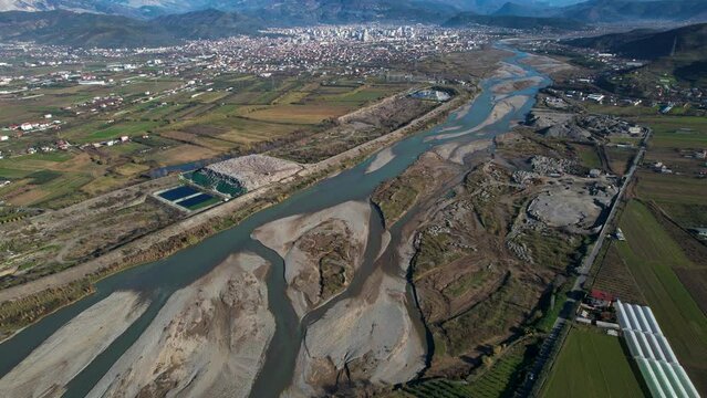Landfill and sand mining industries destroy the river and the surrounding environment in Elbasan, Albania