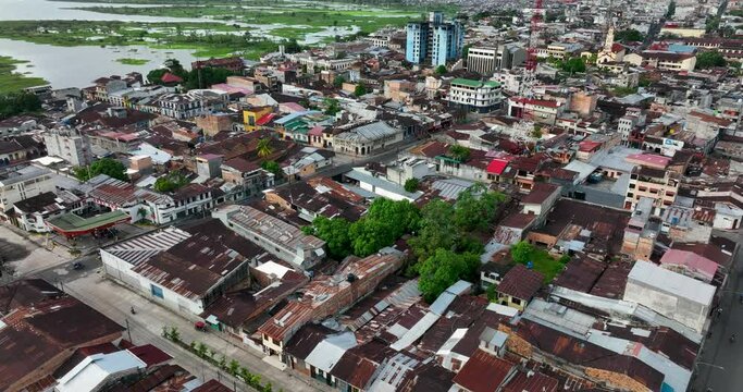 Aerial view of Iquitos, Peru, also known as the Capital of the Peruvian Amazon. It is also the largest city in the world that is not reachable by road. Floating house. High Resolution 4k