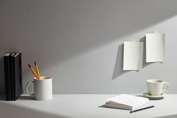 light wooden desk at morning with window light. copy space