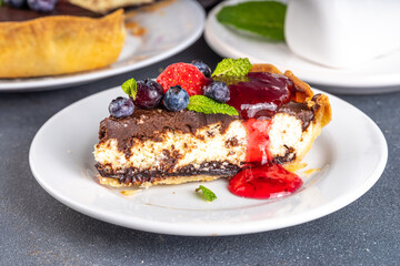 Homemade cheesecake with chocolate and berry