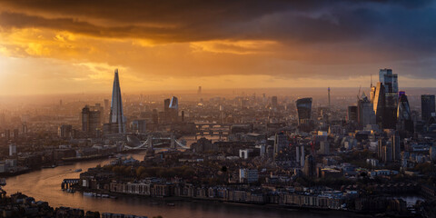Panorama of the London skyline from Westminster until the City skyscrapers during a cloudy sunset, United Kingdom 