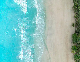 The ecology with Waves on the beach as a background. Beautiful natural background at the summer time-above view