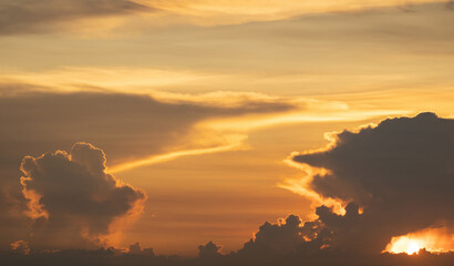 Sunset sky. Abstract nature background. Dramatic blue with orange colorful clouds in twilight time.