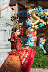 Fototapeta premium chinese new decoration. chinese new year. person in traditional costume. japanese , Chinese doll in traditional costume.