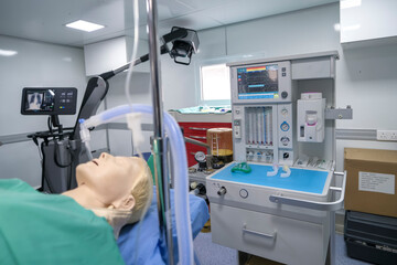 Medical patient simulator in the operating room of a hospital emergency room. Equipment and medical devices.