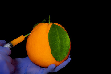 Orange with inserted syringe . Grapefruit symbolizes the fear of injections. Fruit contamination...