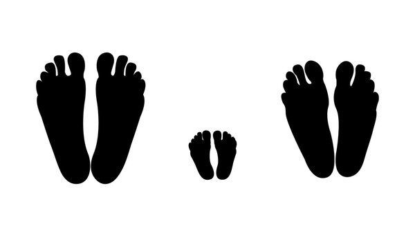 Silhouettes Of The Feet Of Mom, Dad And Baby. Family. Black Silhouettes On White Background.