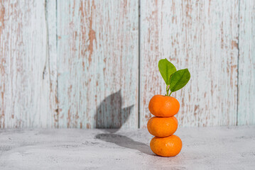 mini clementines on a wooden background