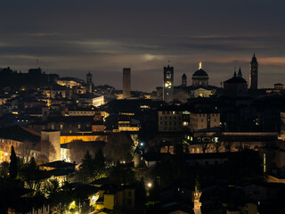 Bergamo. One of the beautiful city in Italy. Landscape at the old town from the hill at evening. Amazing view of the towers, bell towers and main churches. Touristic destination. Best of Italy