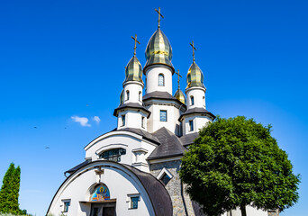 Christian church cross in high steeple tower for prayer
