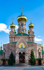 Christian church cross in high steeple tower for prayer