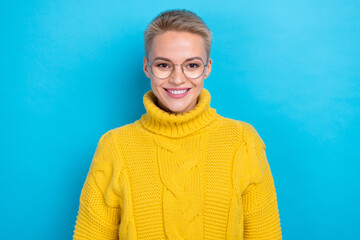 Photo of stunning lovely lady wear yellow winter jumper buy glasses nice stylish accessory isolated on blue color background - obrazy, fototapety, plakaty