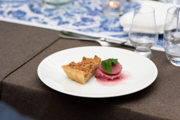 small portion of apple pie and sorbet