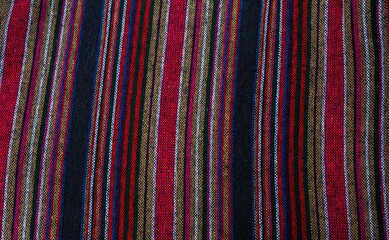 Crochet texture of colored striped knitted fabric