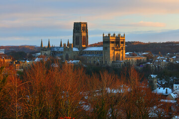View of Durham Cathedral bathed in warm evening light on a  Winter evening. County Durham, England, UK.
