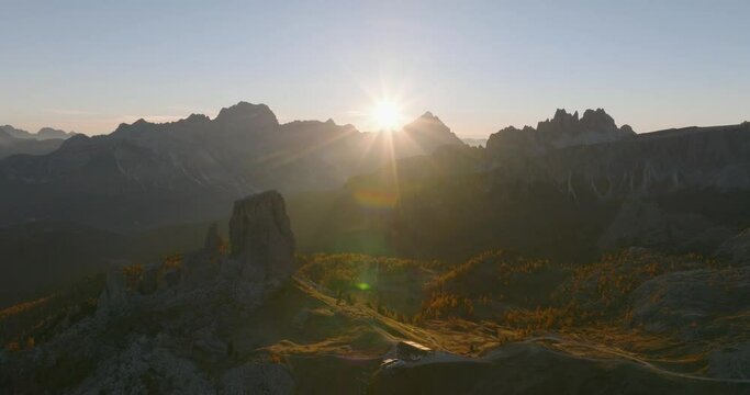 a sunset over the peaks of the dolomite mountains. Aerial images