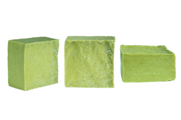 Three bars of traditional handmade organic olive soap, isolated on white background. Body care consept.