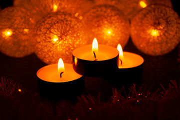 Obraz na płótnie Canvas christmas luminous decoration garland with three candles