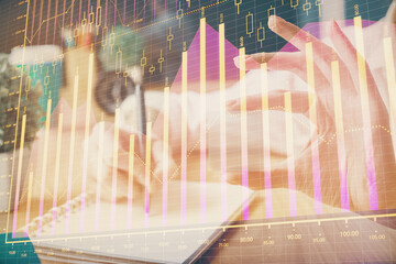 Forex chart displayed on woman's hand taking notes background. Concept of research. Multi exposure
