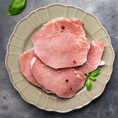 pork meat raw slice cut steak fresh meal food snack on the table copy space food background rustic top view