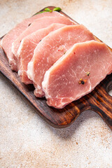 pork meat raw slice cut steak fresh meal food snack on the table copy space food background rustic top view