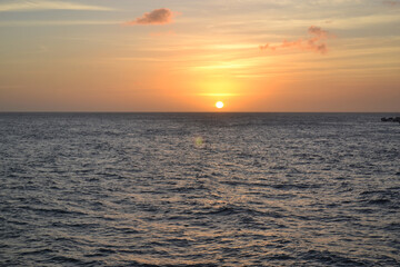 a beautiful sunset in the caribbean sea