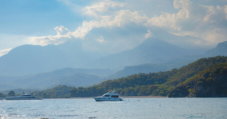 Turkey travel, mediterranean area on a warm summer day. beach of Phaselis An ancient port city with a beach and the ruins of ancient Roman baths, theaters, aqueducts and a market.