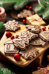 Christmas gingerbread cakes among the festive decor. New Year's traditional pastries closeup