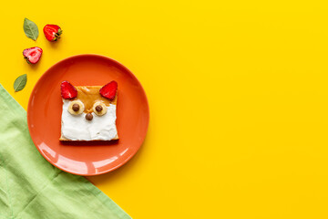 Funny kids sandwich fox face - toast bread with peanut butter and strawberries