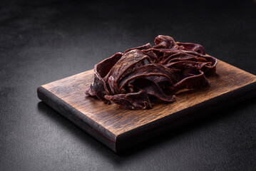Delicious salted dried beef cut into slices as an appetizer for beer
