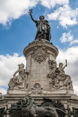Fototapeta na wymiar Statue dedicated to the French Revolution, located on the Plas de la Republique, in Paris, France