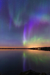 Northern lights reflected in the sea. Nykarleby/Uusikaarlepyy. Finland