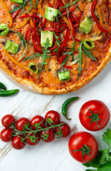 Classic italian vegetarian pizza in white wooden desk.Top view