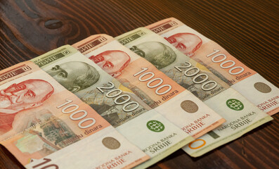Group of Serbian Dinar banknotes, perfect for the background. There are banknotes of 1000 and 2000 dinars.