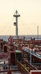 Pipe line with crane on main deck oil tanker