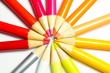 Naklejka premium colored pencils on white background