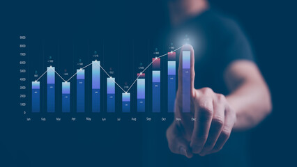 Analyst working with Business Analytics and Data Management System on graph make a report with KPI and metrics connected to database. Corporate strategy for finance, operations, sales, marketing