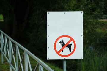 No dog walking sign, dogs are not allowed to walk in the park, prohibition sign for pets.