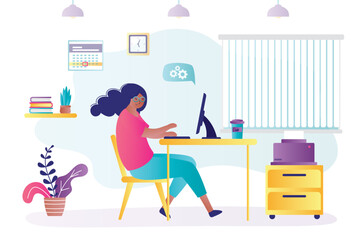 Confident female employee at workplace. African american businesswoman working at computer. Office room interior with furniture. Freelancer or business woman work remotely.