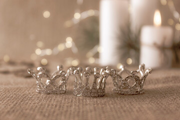 Happy Epiphany day concept. Three silver crowns, symbol of Tres Reyes Magos (Three Wise Men) on...
