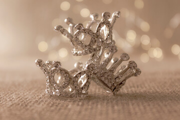 Happy Epiphany day concept. Three silver crowns, symbol of Tres Reyes Magos (Three Wise Men) on...