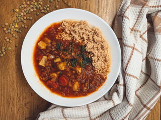Mediterranean vegetable soup with carrots, lentils and fresh parsley.