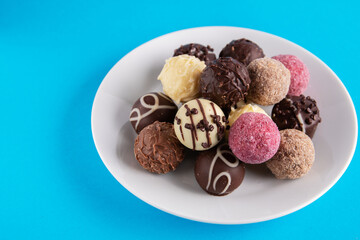 photo round chocolate candies on a plate