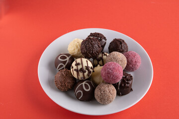 photo round sweets on a white plate